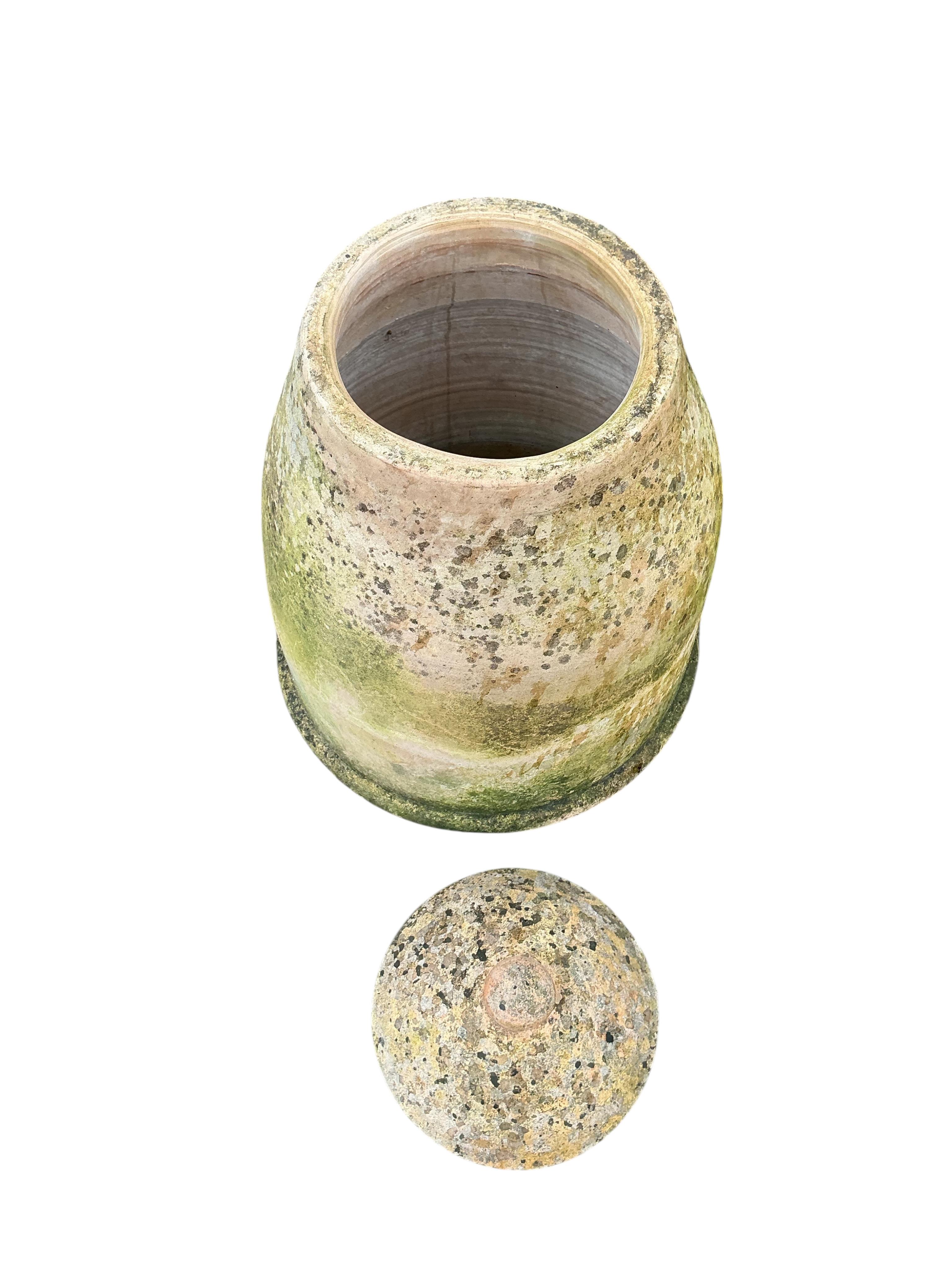 Two circular earthenware rhubarb forcers and covers, height 46cm